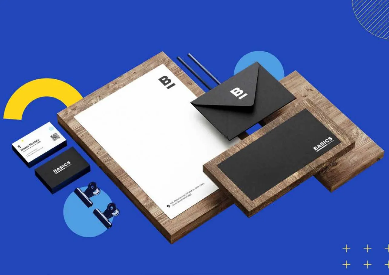 Business cards, letterhead and envelope on a blue background