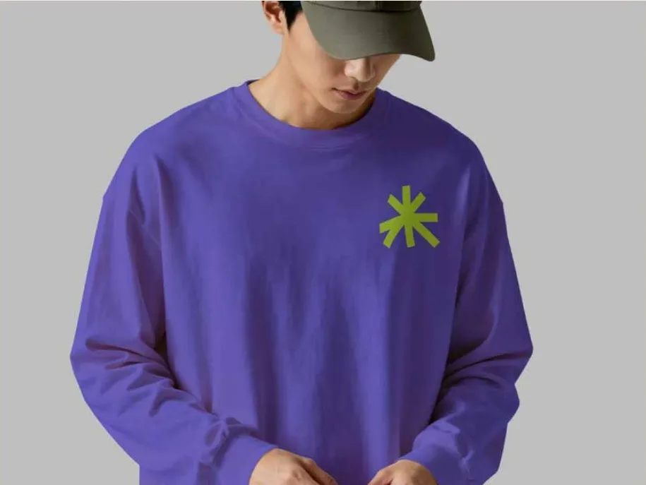 Purple sweatshirt with the lime asterisk mark