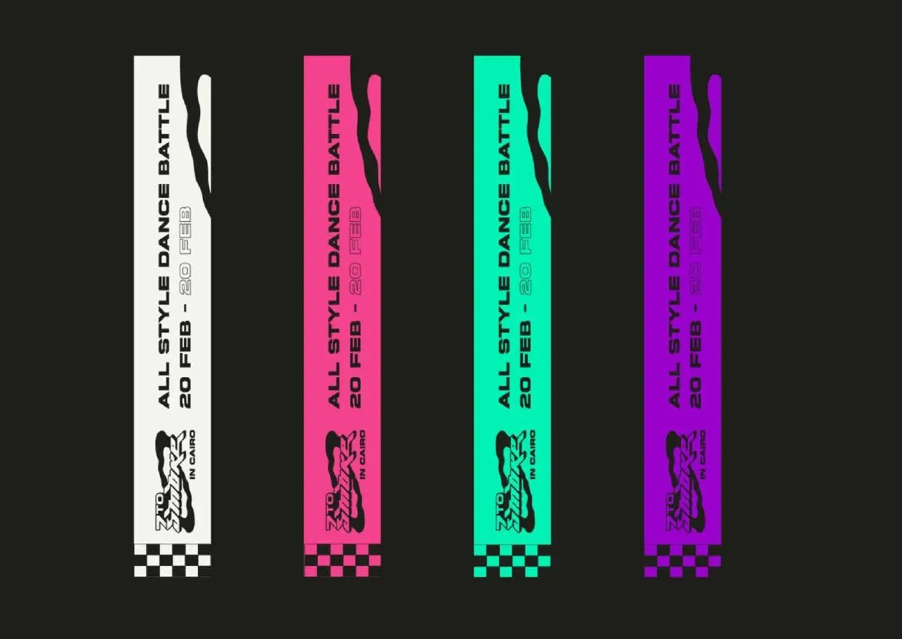 Four event wristbands in white, pink, teal and purple