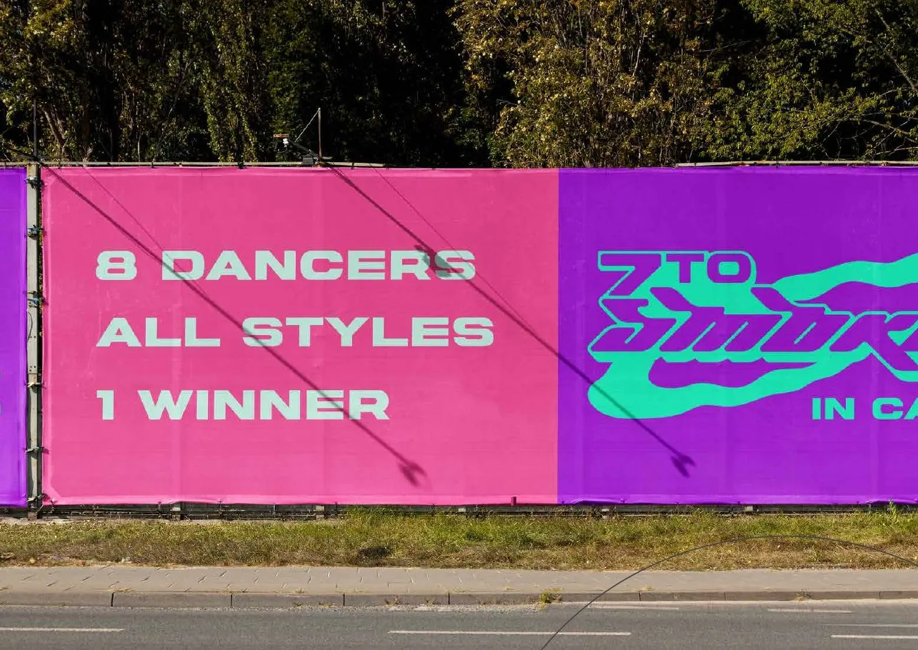 Pink and purple street hoarding reading 8 dancers, all styles, 1 winner